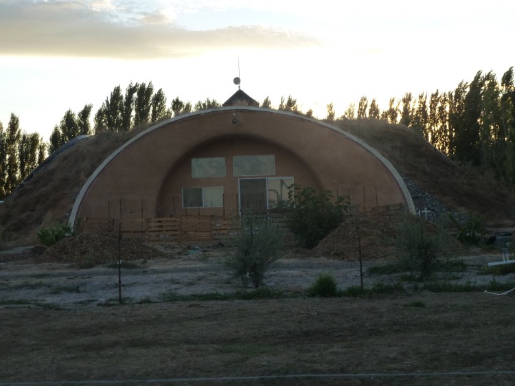 Arched bunker-tunnel-house